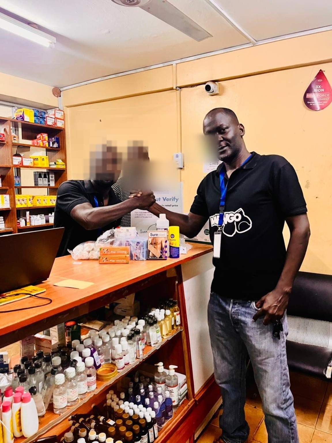 Founder during a practical field engagement; other participants' faces and identifying signage are intentionally obscured